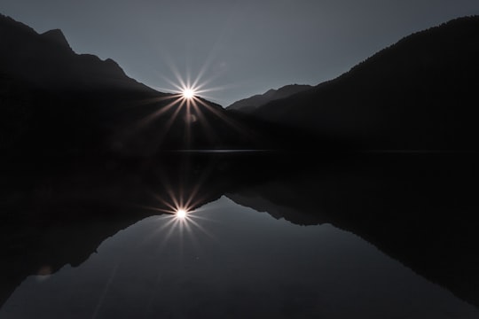 silhouette of mountain under cloudy sky in Antholzer See Italy