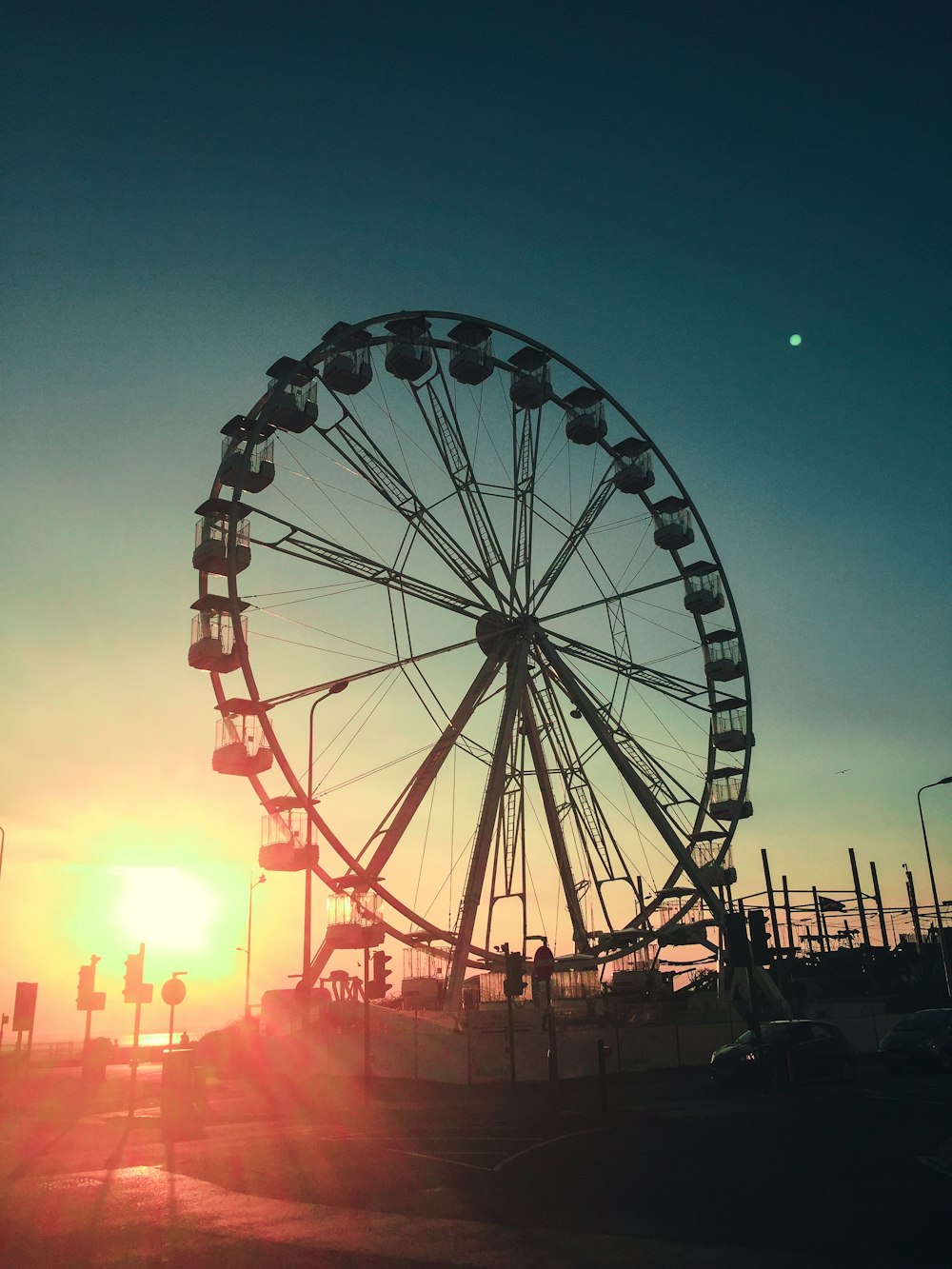 black ferris wheel during blue hour