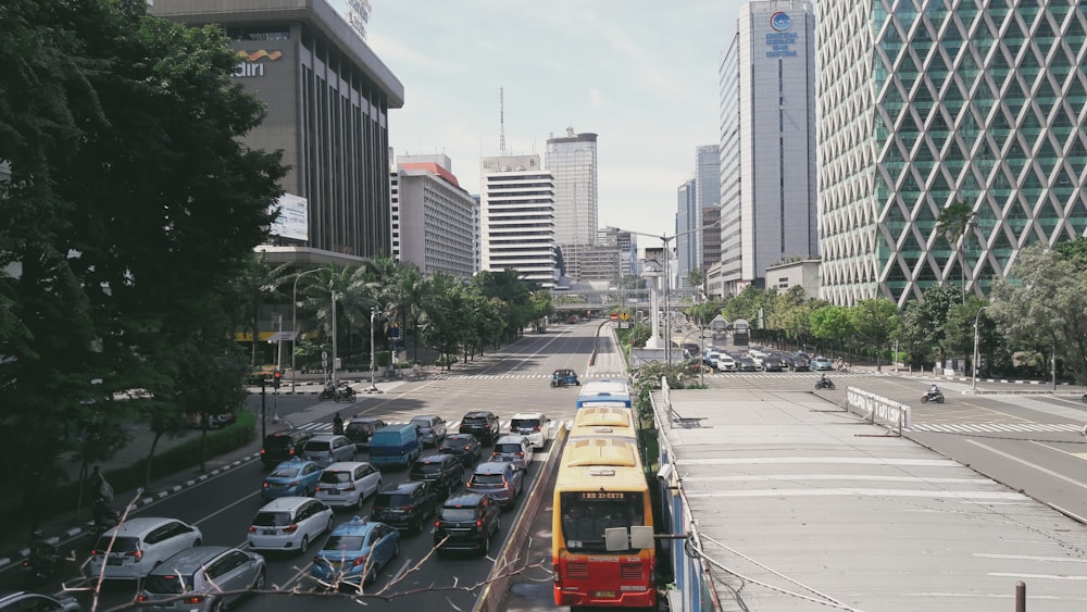 overlooking photo of vehicle on roads near high rise buildings