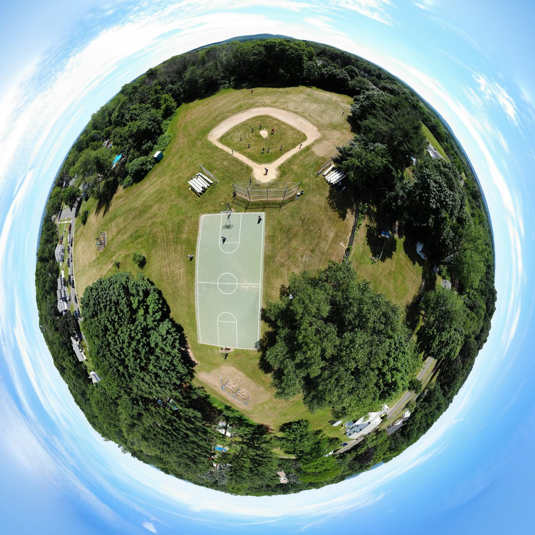 ‘Little Planet’ style edit of a 180-degree panorama of my daughter’s little league game this summer. Shot with DJI Mavic Air from about 150 feet up.