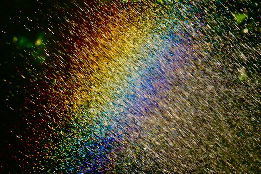 Rainbow created with garden hosepipe