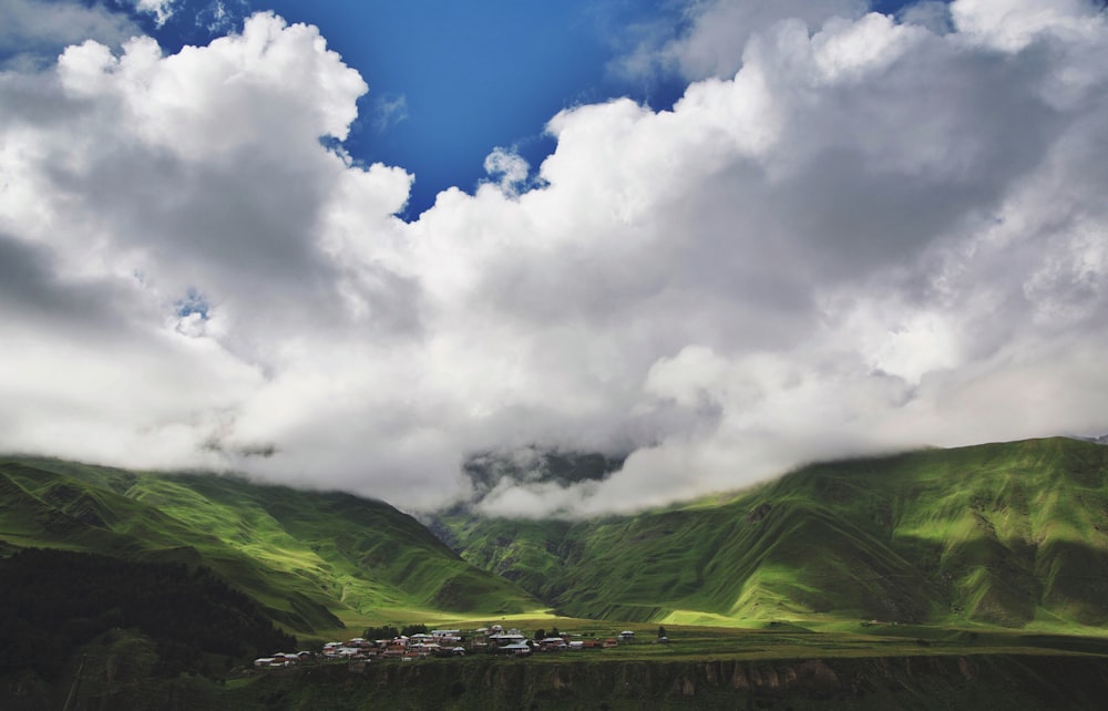 valley under white clouds