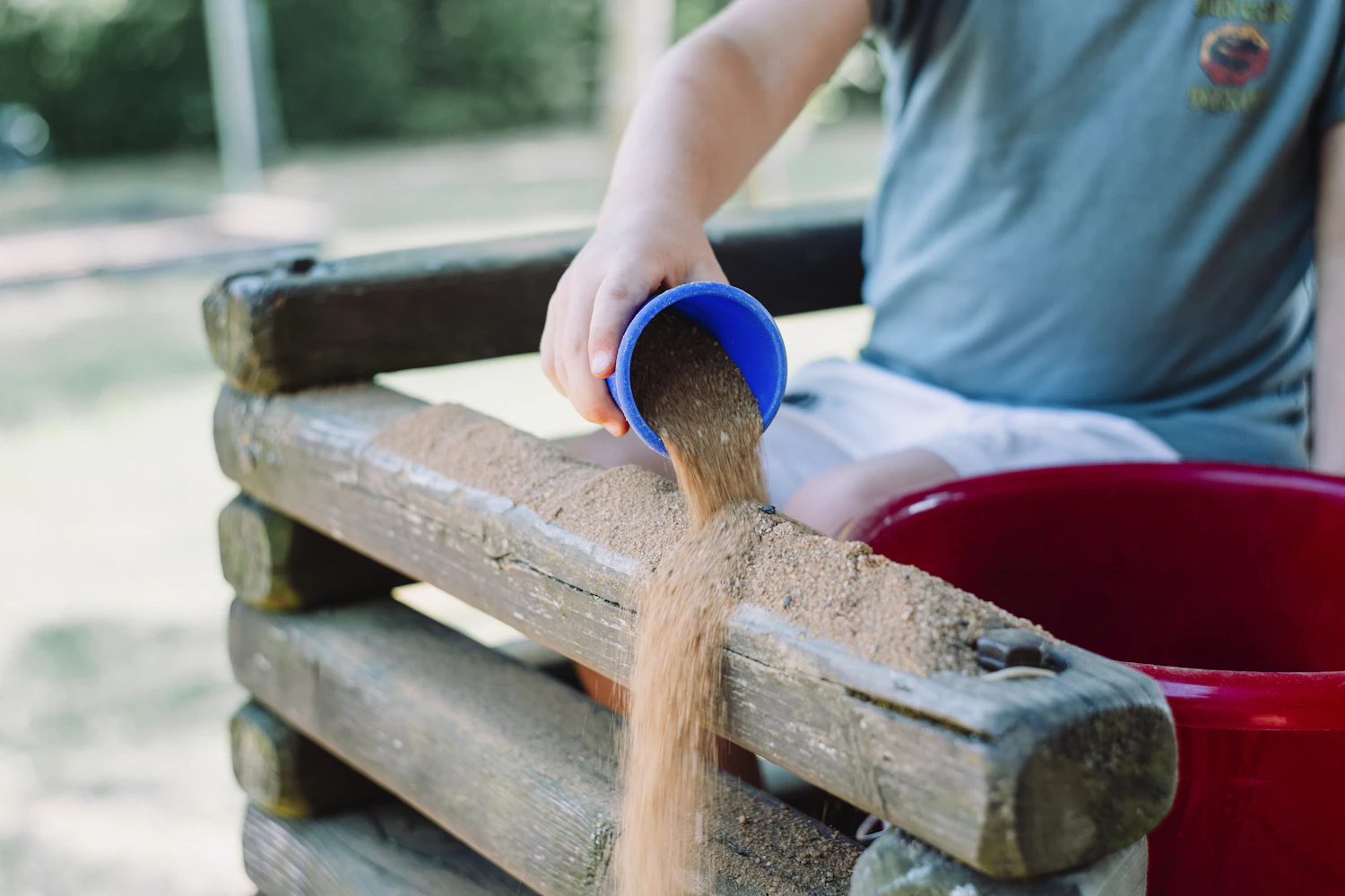 Colorful sensory play materials spread out on a table for a classroom activity