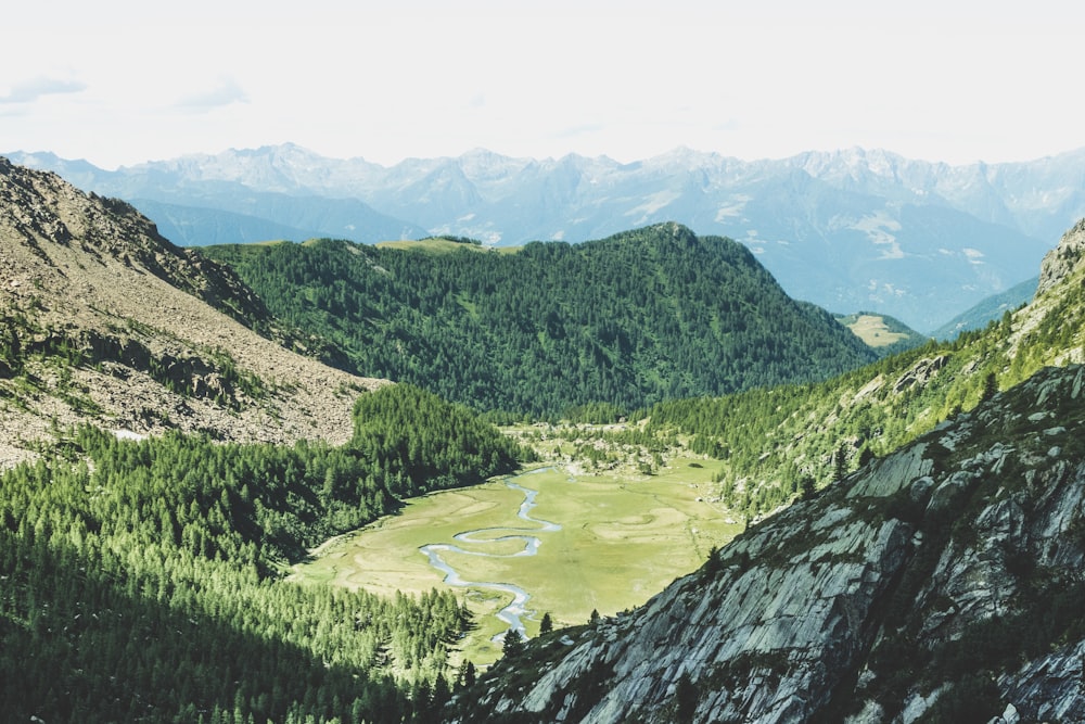 landscape photography of river between mountains