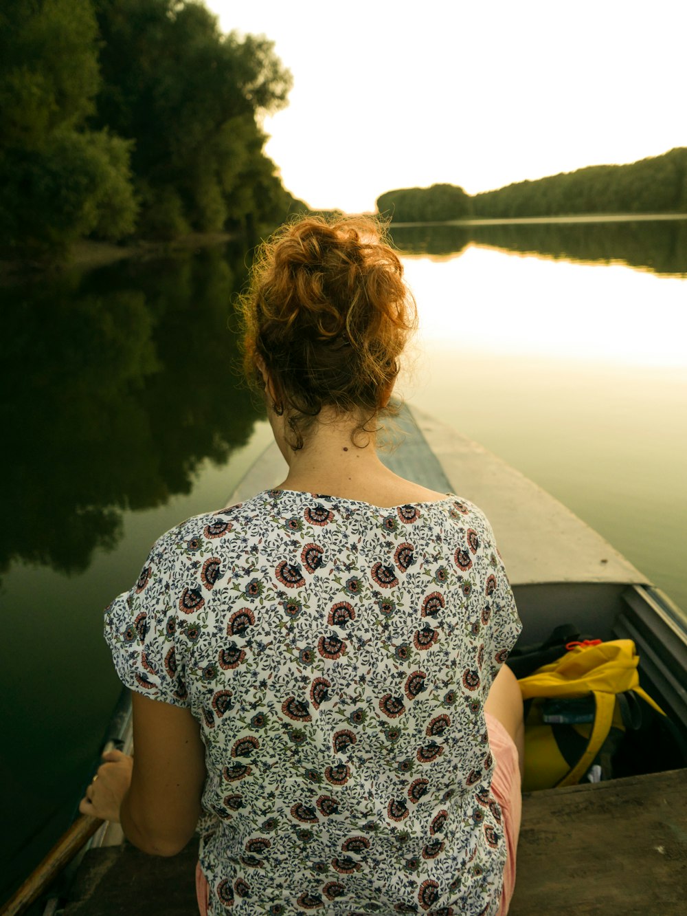 woman riding on boat