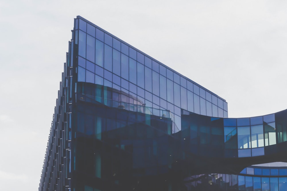 blue city building under white clouds