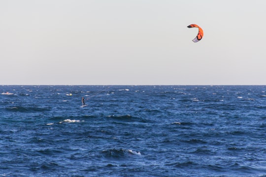 person parasailing on water in Collaroy Australia