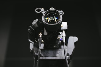 A close-up of a camera capturing a video shoot.