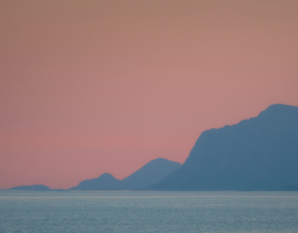 silhouette of mountain range in landscape photography