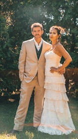 woman in white dress beside man