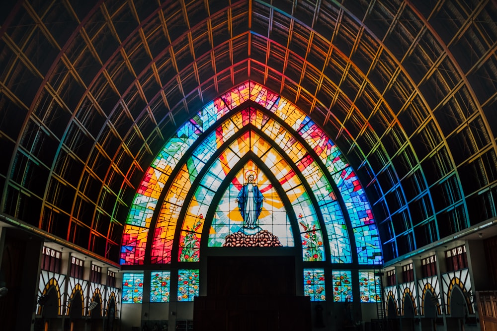 Mother Mary mosaic glass window cathedral interior