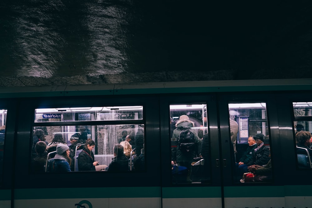 people inside vehicle during nighttime