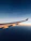 timelapse photo of white plane wing