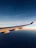 timelapse photo of white plane wing