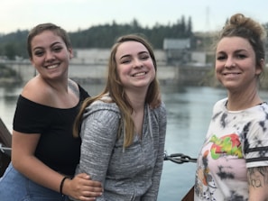 Three generations of the Perri family standing proudly at a completed Blaise Construction project