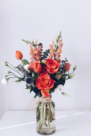 Elegant loose floral arrangement with garden roses and greenery