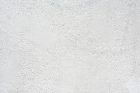 white textured plaster wall surface