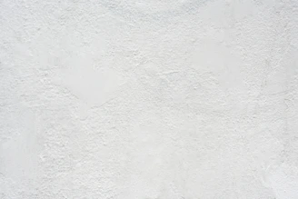 white textured plaster wall surface