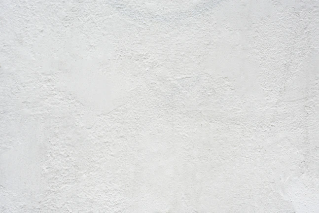 white textured plaster wall surface