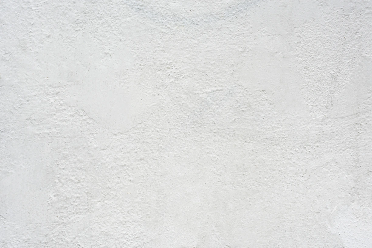 white textured plaster wall surface