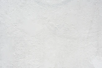 white textured plaster wall surface
