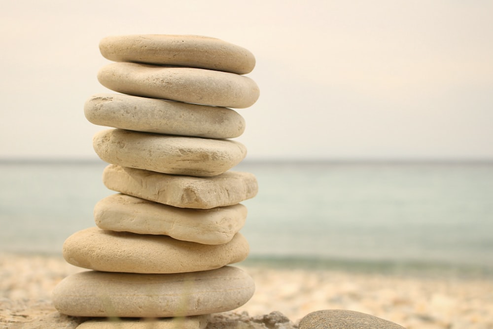 stack white stones on seashore