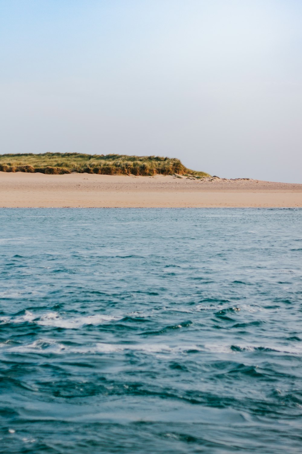 body of water with a view of island