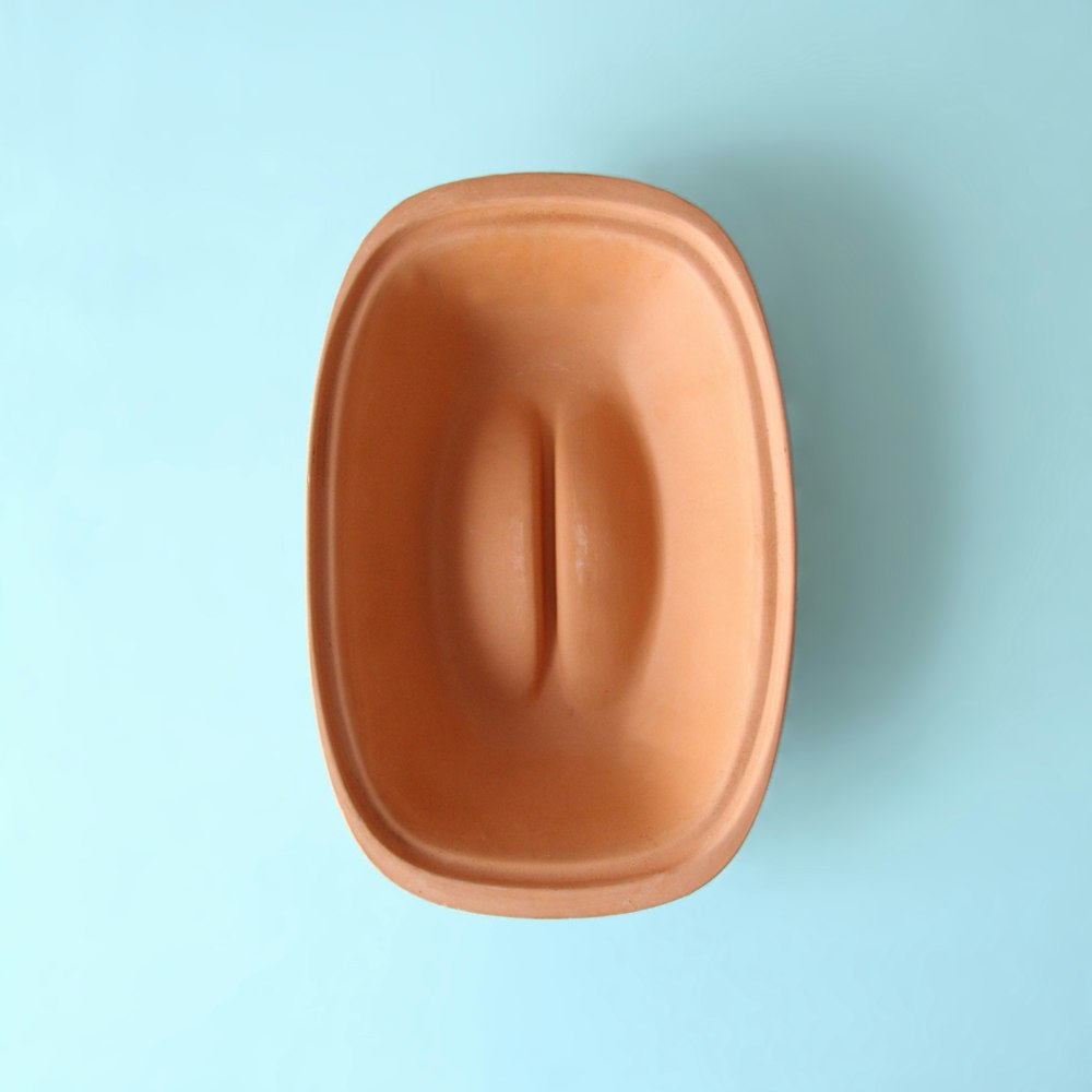 coperchio ovale in plastica marrone