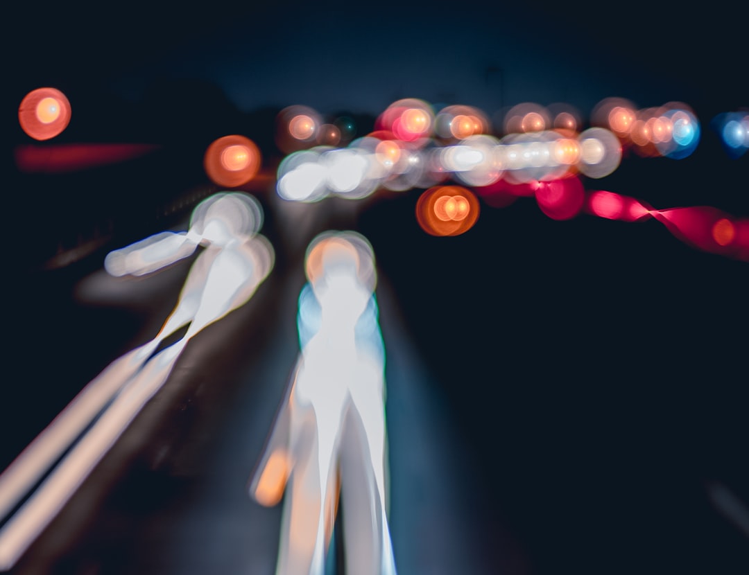 time-lapse of lights, On a warm summer night in the city, a friend and I walked on a bridge overlooking the highway. After capturing some traditional long exposure shots, I wanted to try something a little different. Knowing a lot of background images work well when they’re blurred, I tried for a more abstract style with this shot.<p></figure>This was shot on a Sigma 18-35mm f/1.8 DC HSM Art Lens for Canon, adapted for my Sony a7R II. The effect was achieved through a rack focus during a long exposure of the highway below.