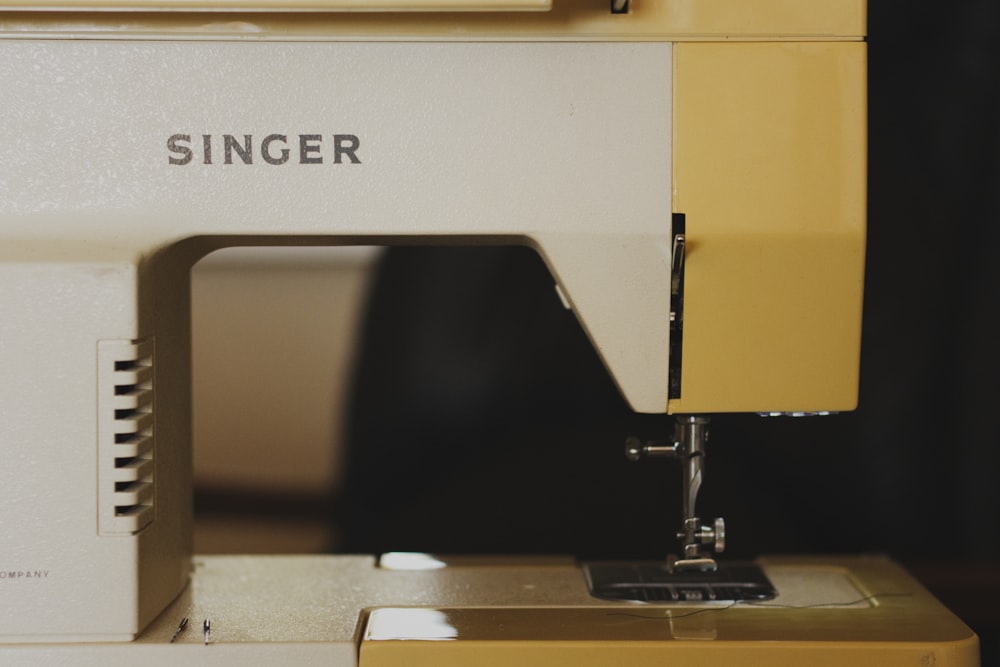 white Singer sewing machine