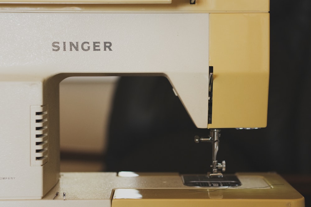 white Singer sewing machine