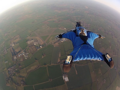 sky diver diving on air extreme teams background