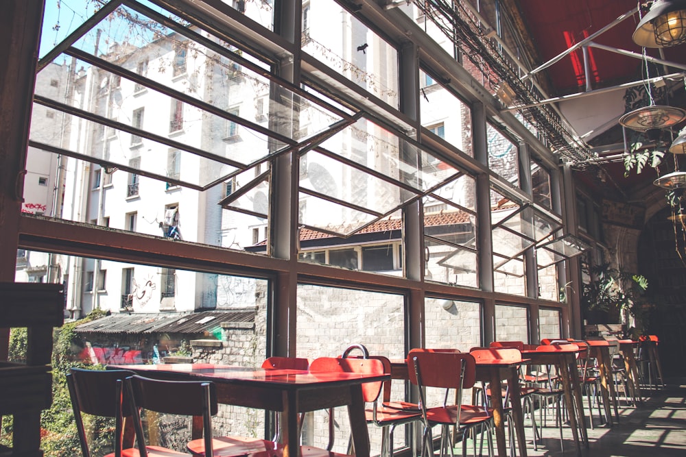 table on restaurant beside white concrete building