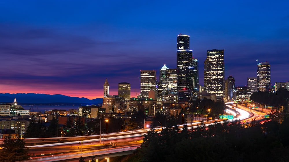 time-lapse photography of street and building during nighttime