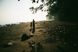 woman and girl on field