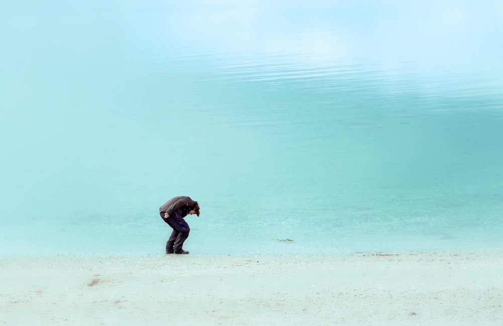 man standing on shore