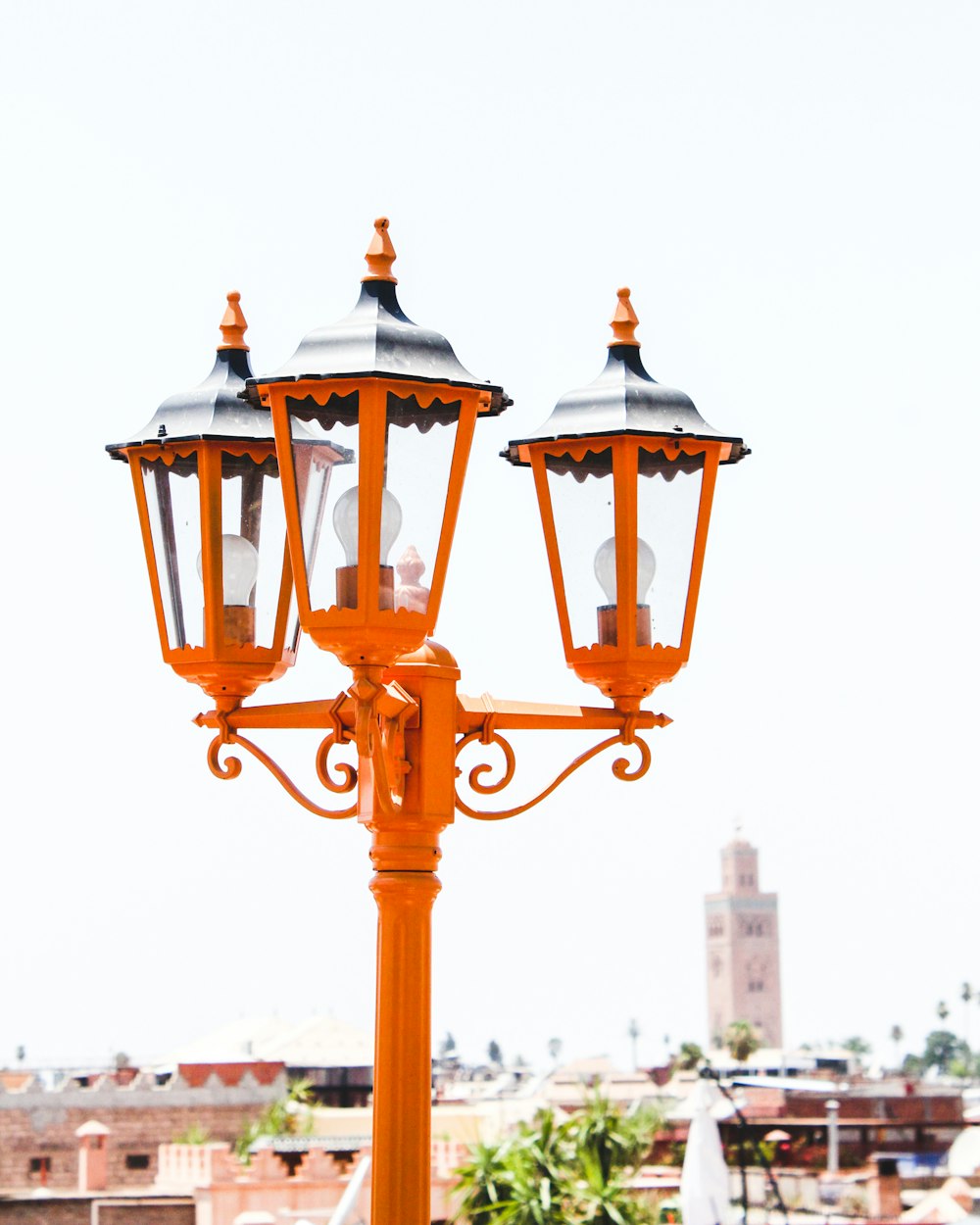 orange street light under sunny sky