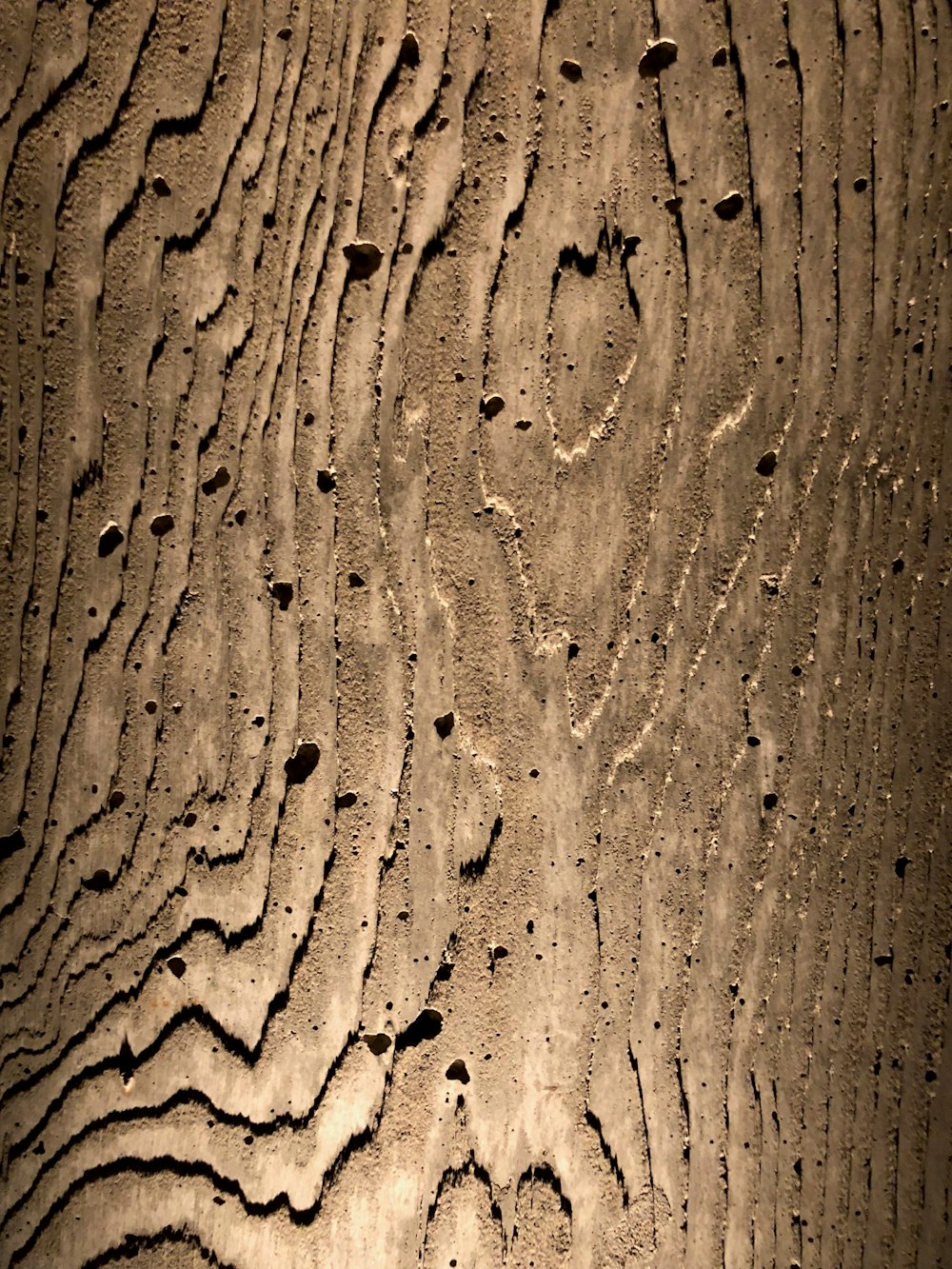 a close up of a piece of wood with a pattern on it