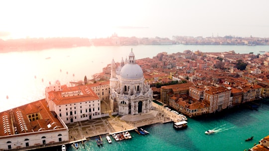 aerial photo of concrete buildings near calm water in Università Iuav di Venezia Italy