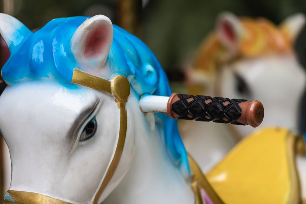 closeup photo of horse carousel