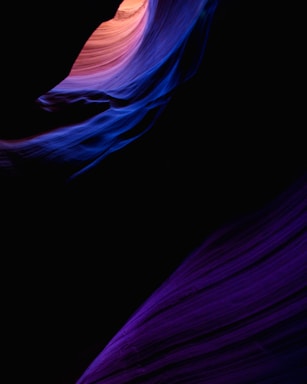 Abstract 3D rendering of geological layers with deep blue and copper accents.