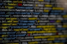 yellow and blue data code displayed on screen