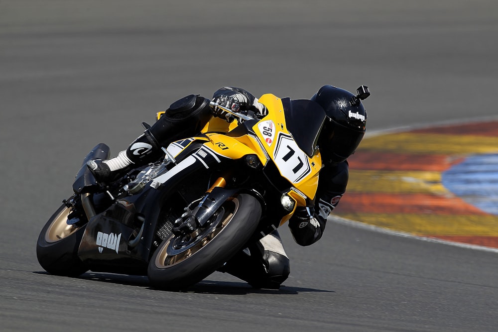 yellow and black sports motorcycle