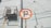 orange No parking road sign