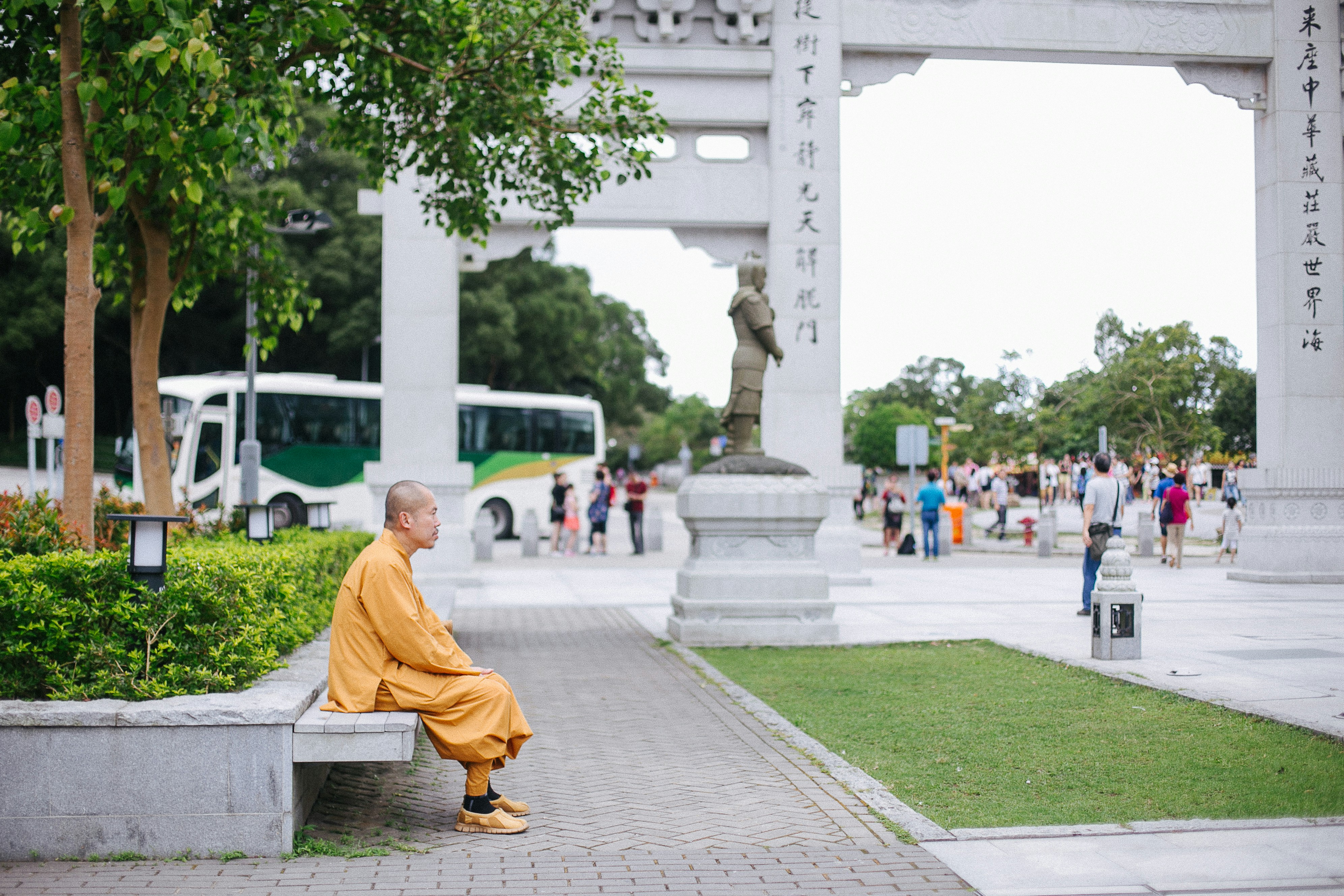 man sitting on bench
