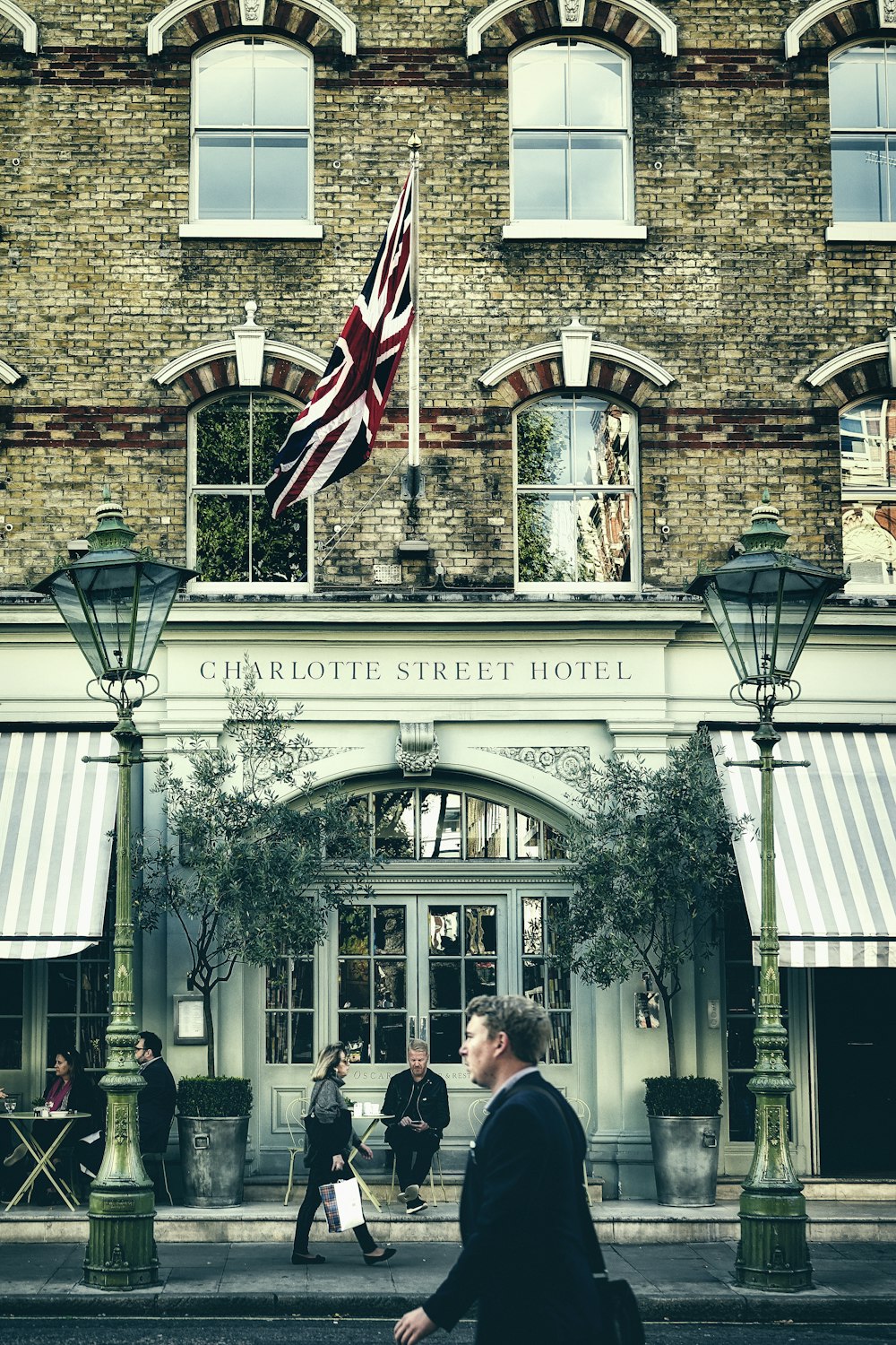 man sitting in front of Charlotte Street hotel