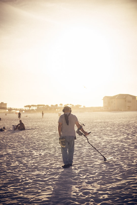 man holding black power tool in Pensacola Beach United States