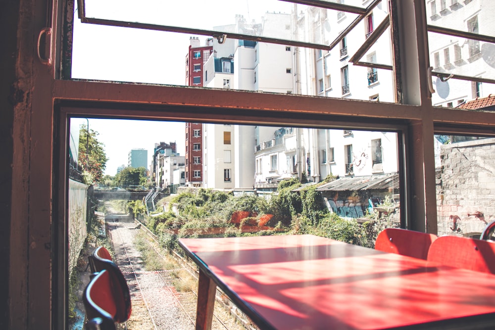 rectangular red wooden table