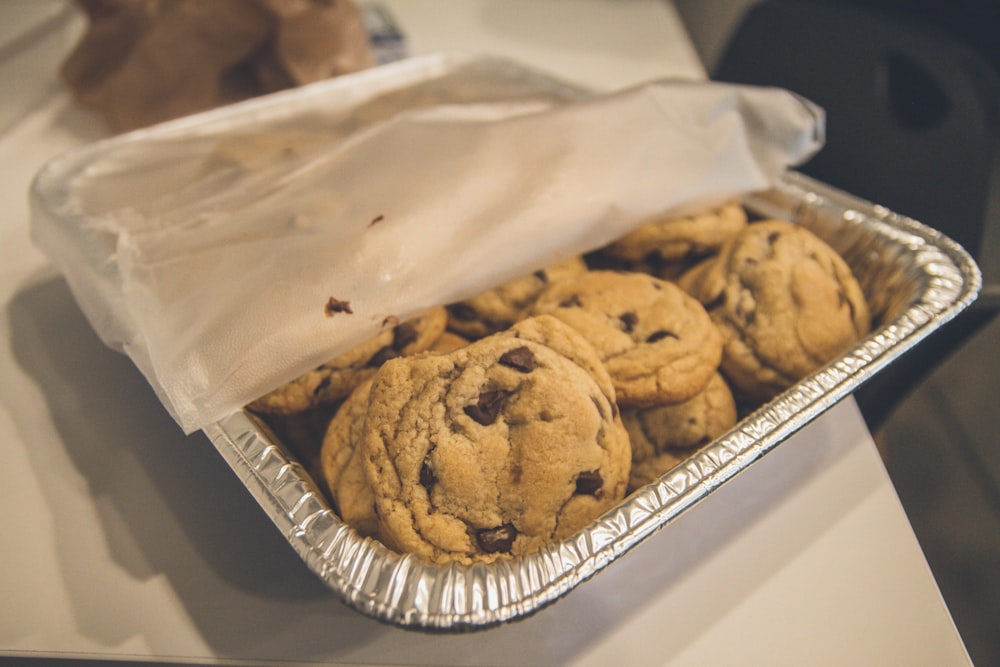 shallow focus photo of cookies on gray tray