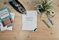white printing paper with Marketing Strategy text